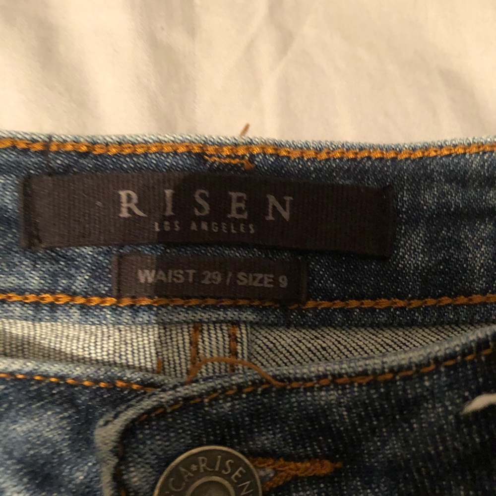 Only worn once Risen- size 9 jeans.